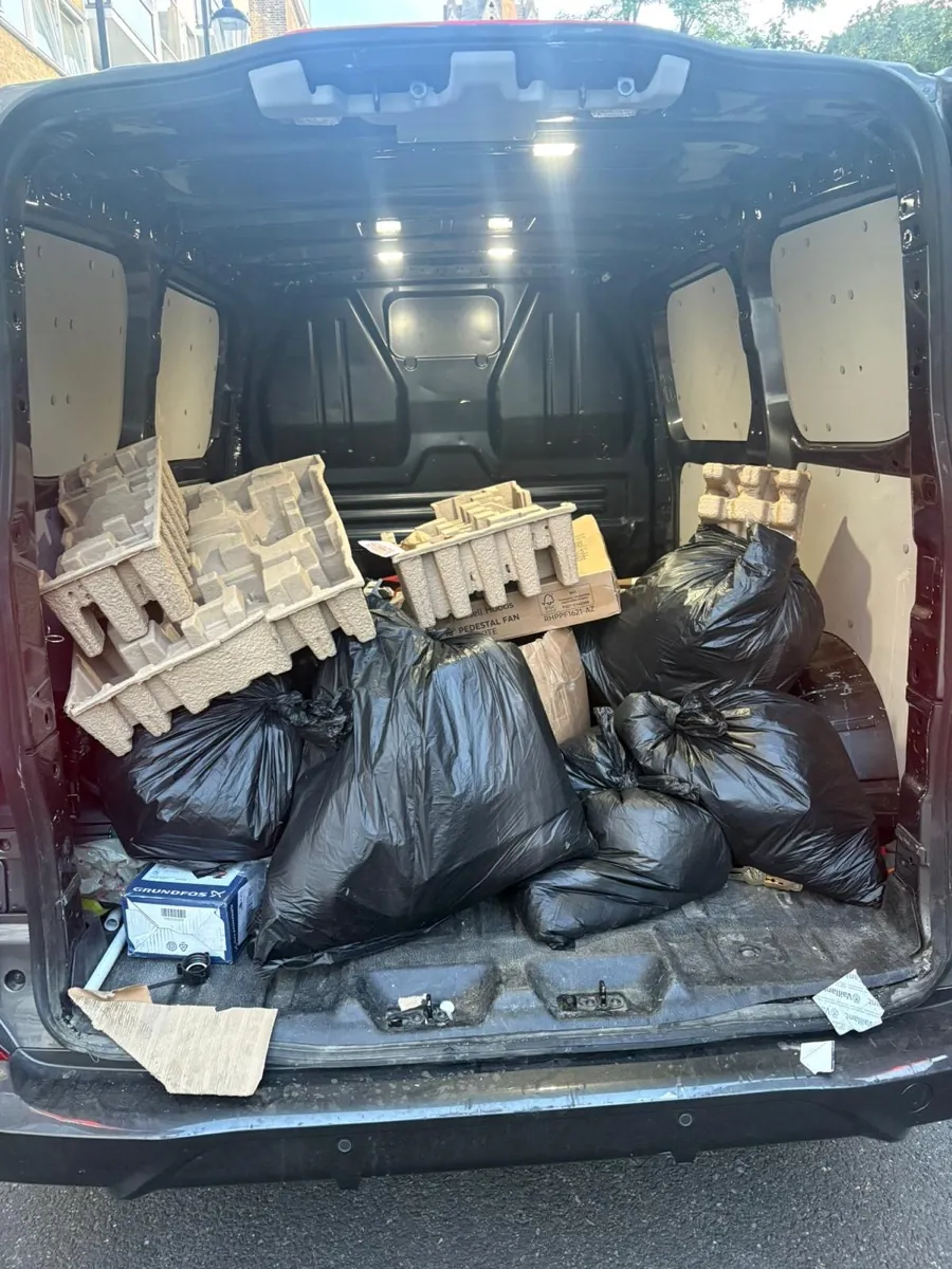 Van Thats Quick van loaded with bagged waste, cardboard and packaging from a rubbish removal job in Harlesden NW10