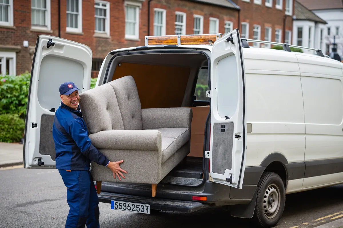 Van Thats Quick crew collecting a sofa and bulky household waste in London